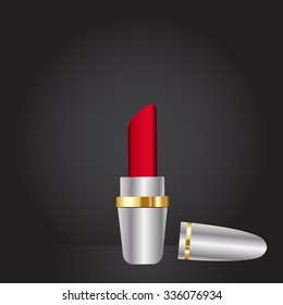 Red lipstick stand on the dark grey with spot light wallpaper, Concept for Fashion or cosmetic