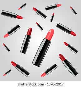 red lipsticks on the grey background