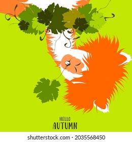 A red llama, an alpaca with a green leaf in its teeth. Holly twigs, a wreath of leaves, yellow and green foliage, a branch. It's an autumn, sunny day. Green background. The inscription "Hello autumn".