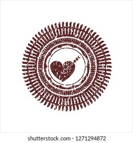 Red love icon inside distress rubber stamp with grunge texture