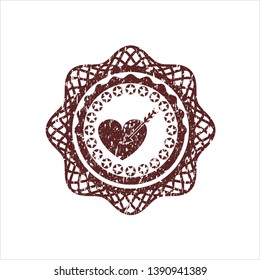 Red love icon inside distressed grunge stamp