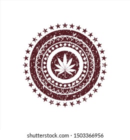 Red marijuana leaf icon inside distress rubber stamp