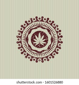 Red marijuana leaf icon inside distressed rubber grunge stamp