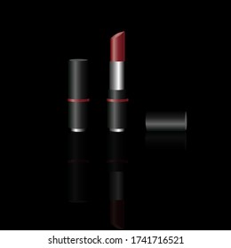 Red - Maroon colour Lipstick in silver and black packaging with opened and closed black cap isolated on black background.