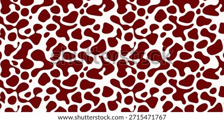 Red and maroon organic pebble spots or animal skin seamless pattern.