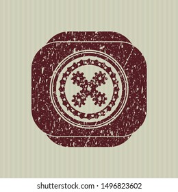 Red mechanism icon inside rubber stamp