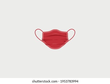Red medical mask on a light background. Medical accessory