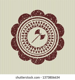 Red medieval axe icon inside distressed rubber stamp with grunge texture