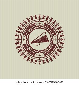 Red megaphone icon inside rubber stamp