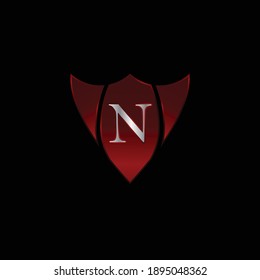 Diseño del logotipo Escudo metálico rojo para la letra N. Diseño De Logotipo De Letra Metálica Roja Realista N. Diseño de logotipos para coches, empresas de seguridad y otros.