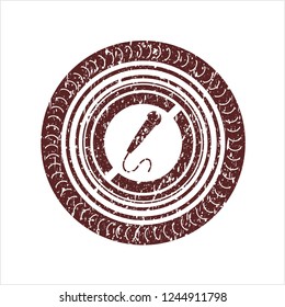 Red microphone icon inside distressed grunge style stamp