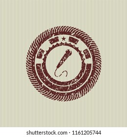 Red microphone icon inside grunge stamp