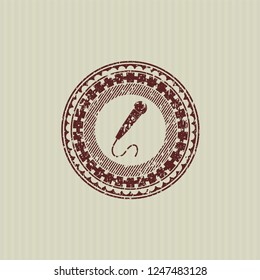 Red microphone icon inside rubber seal