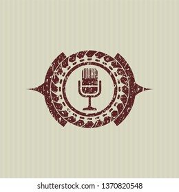 Red microphone icon with rubber seal texture