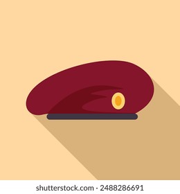 Red military beret with a yellow insignia lying on light background, military uniform concept