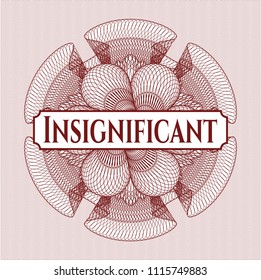 Red money style emblem or rosette with text Insignificant inside