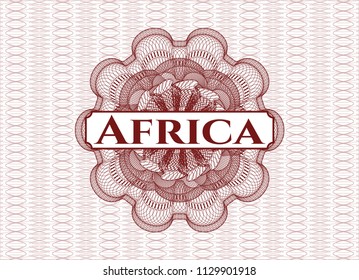 Red money style emblem or rosette with text Africa inside