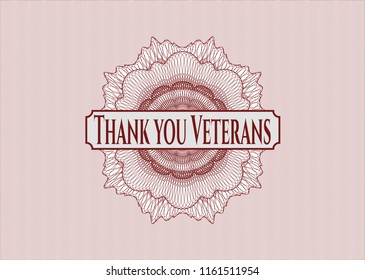 Red money style emblem or rosette with text Thank you Veterans inside