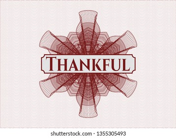 Red money style emblem or rosette with text Thankful inside