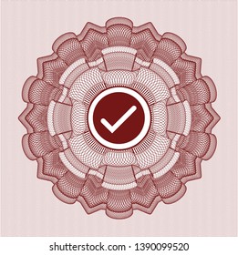 Red money style emblem or rosette with tick icon inside
