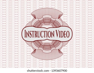 Red money style emblem or rosette with text Instruction Video inside