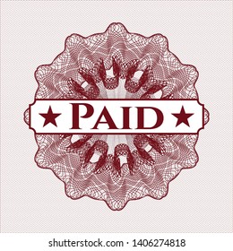 Red money style emblem or rosette with text Paid inside