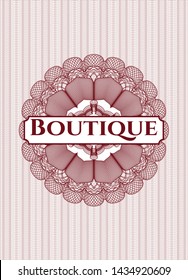Red money style emblem or rosette with text Boutique inside