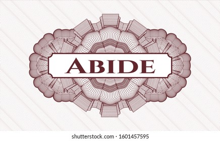 Red money style emblem or rosette with text Abide inside