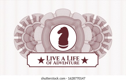 Red money style emblem or rosette with chess knight icon and Live a Life of Adventure text inside