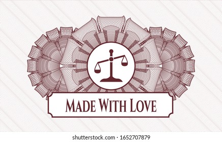 Red money style emblem or rosette with scale icon and Made With Love text inside