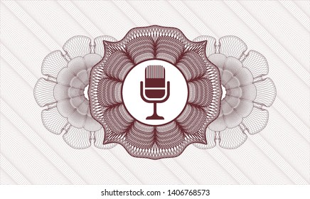 Red money style rosette with microphone icon inside