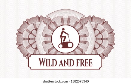 Red money style rosette with stationary bike icon and Wild and free text inside