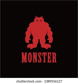 Red monster logo isolated on black background