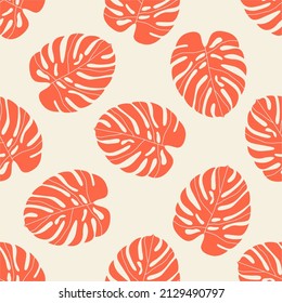 Red monstera leaves on pink seamless pattern. Trendy hand-drawn vector pattern made of monstera plant leaves. Foliage seamless design for banner, card, wallpapers and wrapping. Vibrant exotic pattern.