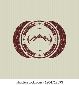 Red mountain icon inside distress grunge style stamp