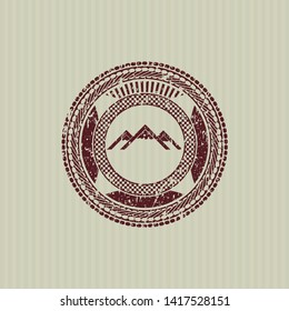 Red mountain icon inside distress grunge seal