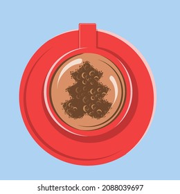 red mug with coffee and christmas tree
