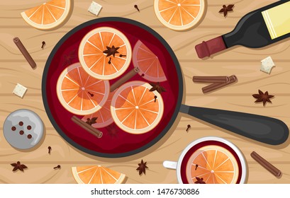 Red mulled wine in a pot with orange slices, cinnamon, cloves and a bucket. White mugs of mulled wine. Flat lay.