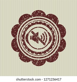 Red mute icon inside distress rubber texture