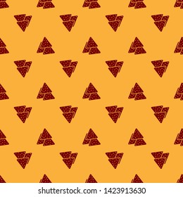 Red Nachos icon isolated seamless pattern on brown background. Tortilla chips or nachos tortillas. Traditional mexican fast food. Vector Illustration