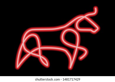 red neon sign bull on black background