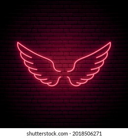 Red neon wings icon. Two glowing wings on dark brick wall background. Vector illustration in neon style.