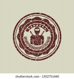 Red ninja icon inside distress rubber grunge texture stamp