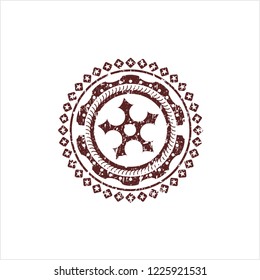 Red ninja star icon inside distressed rubber seal with grunge texture