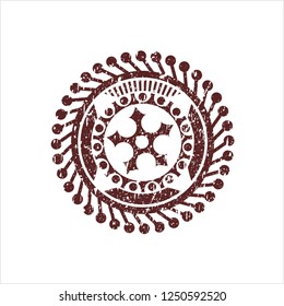 Red ninja star icon inside distress grunge style stamp