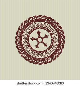 Red ninja star icon inside distressed rubber grunge texture seal