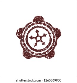 Red ninja star icon with rubber seal texture