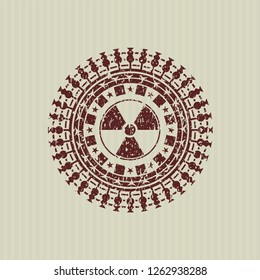 Red nuclear, radioactive icon inside grunge seal