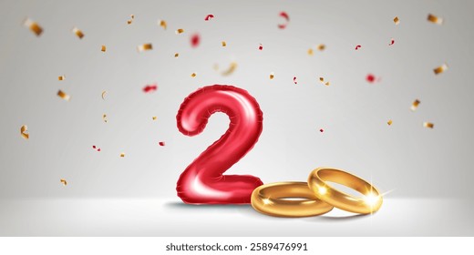 A red number 2 in the form of an inflatable balloon with two gold wedding rings, symbolizing the celebration of the second wedding anniversary, surrounded by colorful confetti, on light background.