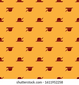 Red Oktoberfest hat icon isolated seamless pattern on brown background. Hunter hat with feather. German hat.  Vector Illustration